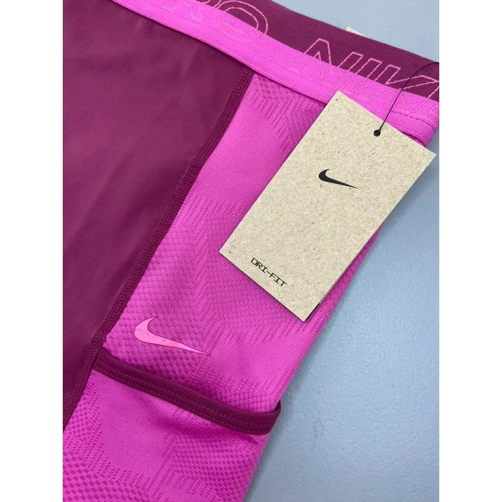 Nike Pro women's XXL‎ pink tight fit compression high rise shorts with pockets